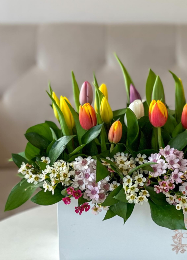 Tulip arrangement in a long box