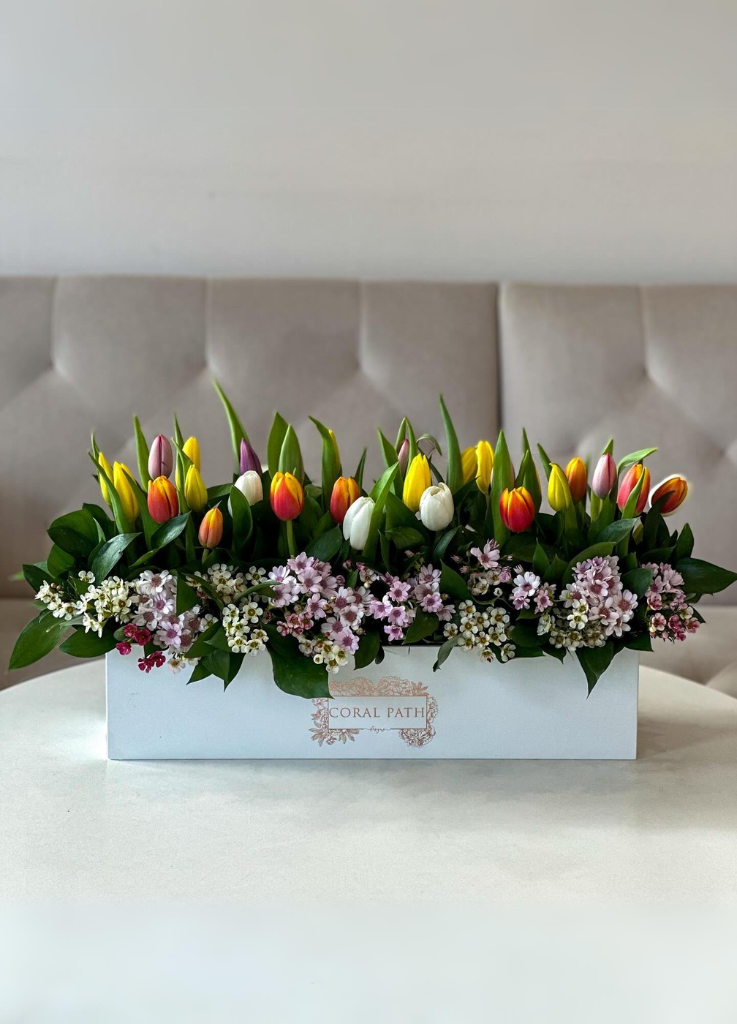 Tulip arrangement in a long box